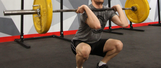 Brandon Coppernoll in a front squat before a thruster.